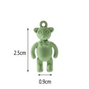 Green matte bear charm with bow for DIY jewelry making, size 2.5cm by 0.9cm