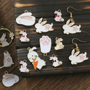 DIY rabbit and cat alloy enamel charms with pearls on vintage wood background