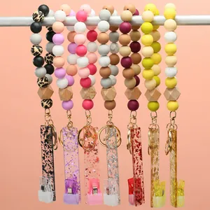 Bracelet porte-clés en perles de silicone colorées avec motif léopard et détails bois