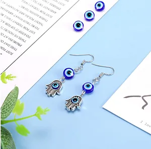 Hamsa Hand earrings with blue Evil Eye resin beads and silver metallic pendants
