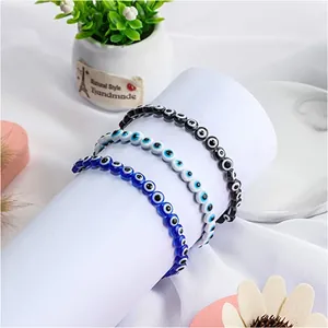 Set of 3 Evil Eye beaded bracelets in deep blue, light blue, and black resin beads