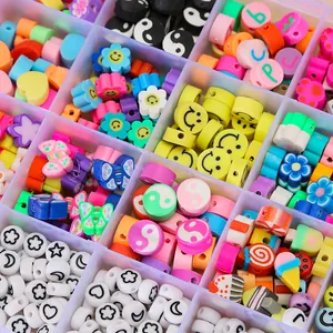 DIY jewelry making kit with 24 compartments of colorful clay beads, smiley faces and letters