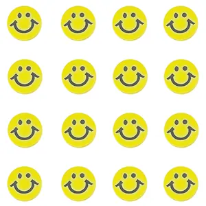 Detailed grid of 16 yellow resin evil eye round beads for DIY jewelry making