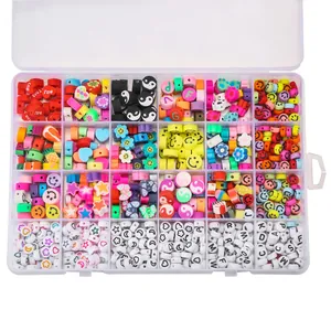 Macro view of a 24-compartment storage box filled with colorful evil eye and letter beads