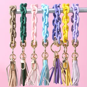 Silicone ring keychain with leather tassel and metal clasp in 7 vibrant colors