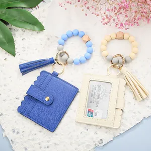 Silicone bead wristlet keychain with PU leather card wallet and tassel in blue and beige