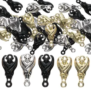 Macro detail of alloy bat skull pendants for Gothic jewelry making and DIY accessories