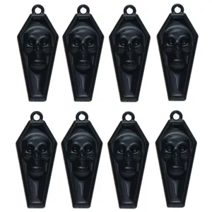 Vue détaillée de 8 pendentifs cercueils noirs avec crânes pour bijoux DIY gothiques