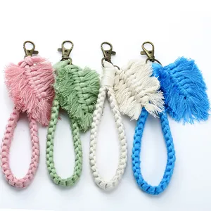 Handmade boho macrame leaf tassel keychain set in pink, green, cream, and blue colors