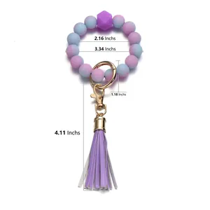Porte-clés perles silicone lumineuses avec pompon violet et dimensions précises