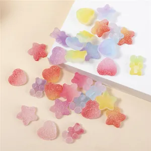 Mix of star, heart, and gummy bear resin charms with a frosted candy sugar coating