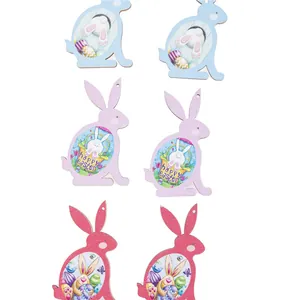 Set of six colorful wooden Easter bunny pendants with Happy Easter egg illustrations