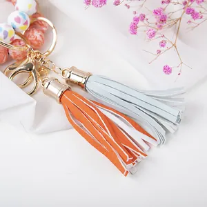 Colorful silicone bead keychain bracelet with orange tassels and heart pattern love charms