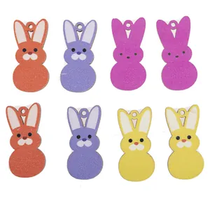 Colorful wooden bunny earrings for Easter featuring four bright colors and rabbit shapes