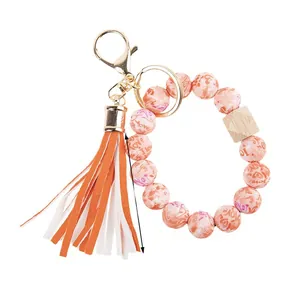 Silicone bead heart bracelet keychain with orange tassel and printed love pattern wood beads