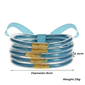 Set de 5 pulseras de silicona azul con purpurina y cierre dorado, 8cm de diámetro