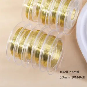 Macro shot of ten rolls of 0.3mm gold jewelry wire for DIY handmade craft projects