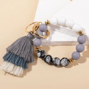 Bohemian silicone bead keychain bracelet with gradient tassel and golden metal rings