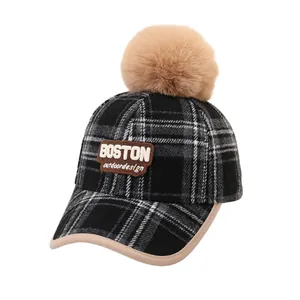 Winter kids plaid baseball cap with BOSTON leather patch and fluffy pom-pom detail