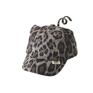 Leopard print baby baseball cap with cute cat ears and curly tail detail for kids