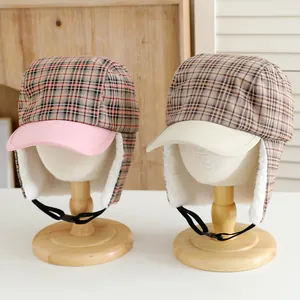 Winter plaid trapper hats with warm fleece lining and ear flaps for boys and girls