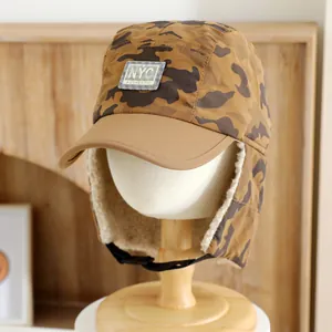 Kids winter camo NYC earflap trapper hat with warm fleece lining and adjustable strap