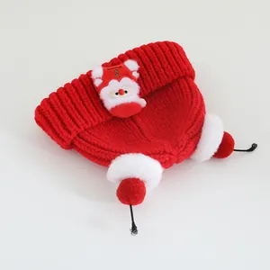 Red knit Christmas hat for kids with Santa patch and plush white faux fur pom poms
