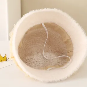 Close-up of cozy faux fur baby bucket hat lining with elastic windproof chin strap