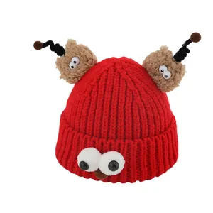 Funny red knit monster beanie for kids with big eyes and antenna for winter warmth