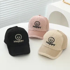 Three kids corduroy and fleece baseball caps in black pink and beige with Happy embroidery