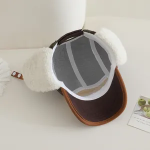 Detailed inner view of warm kids earflap hat with lamb wool lining and adjustable strap