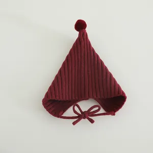 Cute dark red pointed baby knitted hat with pompom and chin ties for autumn winter warmth