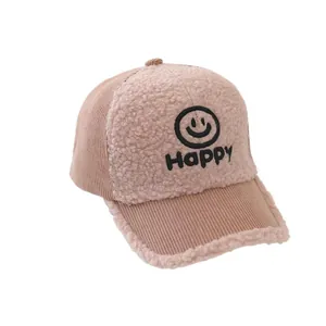 Kids warm pink corduroy baseball cap with fleece front and embroidered happy face