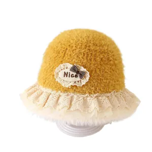 Ginger plush baby bucket hat with lace trim and bow accent for autumn and winter