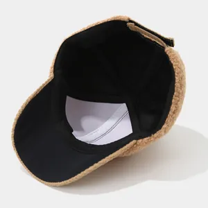 Detail of kids baseball cap showing warm khaki fleece and adjustable strap inside