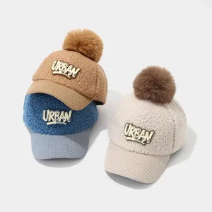 Winter faux shearling baseball cap for kids with pompom and metal Urban patch detail