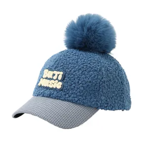 Winter kids blue fleece baseball cap with pompom and music patch for 3-6 years