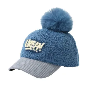Winter fleece baseball cap for kids with blue pom-pom and Urban letter patch design