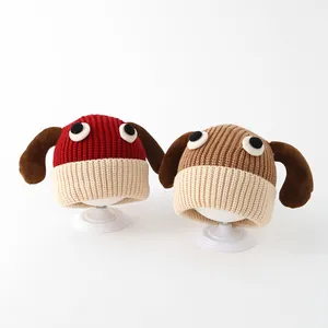 Close-up of knit texture and long ear details on puppy style winter toddler beanies
