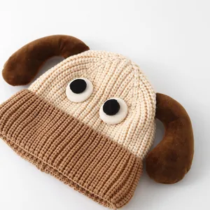 Cute beige baby knit hat with long brown ears and cartoon dog eyes for autumn winter