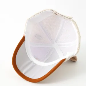 Detail of children baseball cap with breathable mesh lining and teddy bear ears