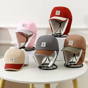 Winter kids trapper hat with sherpa lining and G-patch in multiple color options