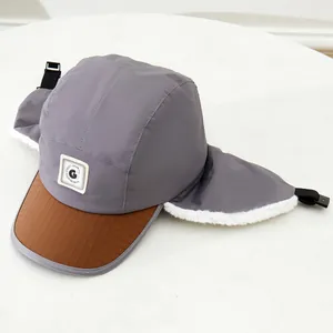 Winter trapper hat for kids with ear flaps, grey windproof fabric and warm faux fur lining