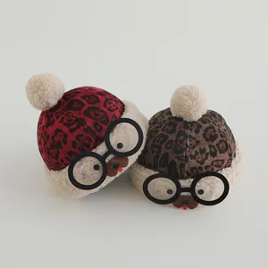 Cute leopard print baby winter hats with fluffy pom-poms and round glasses design
