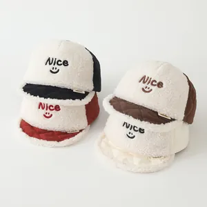 Detail view of four lamb wool baseball hats for kids in black red brown and beige