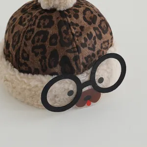 Chinese style leopard print winter hat for kids featuring bear face with glasses decor