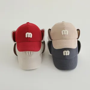 Winter fleece baseball cap with earflaps and m embroidery for toddlers in four colors