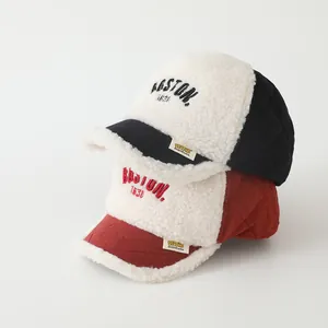 Detail of wool-like fleece baseball cap with Boston 1630 embroidery and quilted texture