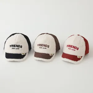 Three color options of children's fleece baseball caps featuring embroidered lettering