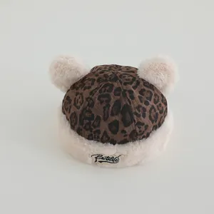 Winter leopard print baby plush hat with pom poms and Butslife label decoration